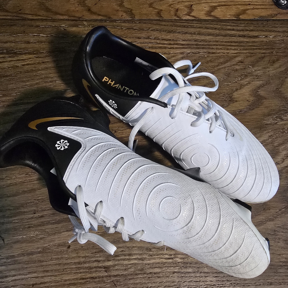 Nike Phantom Cleats in White and Black with Gold Accents